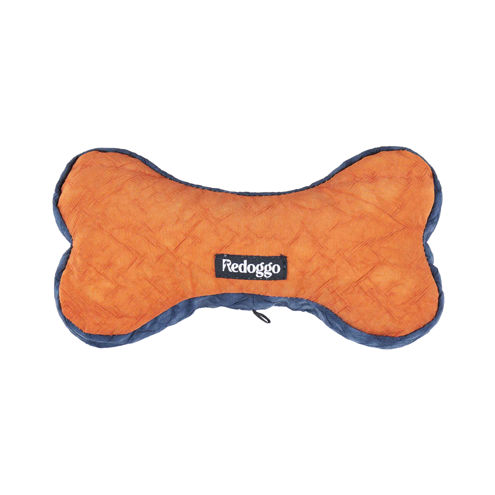 Orangenes Hundespielzeug in Knochenform mit Logo Redoggo