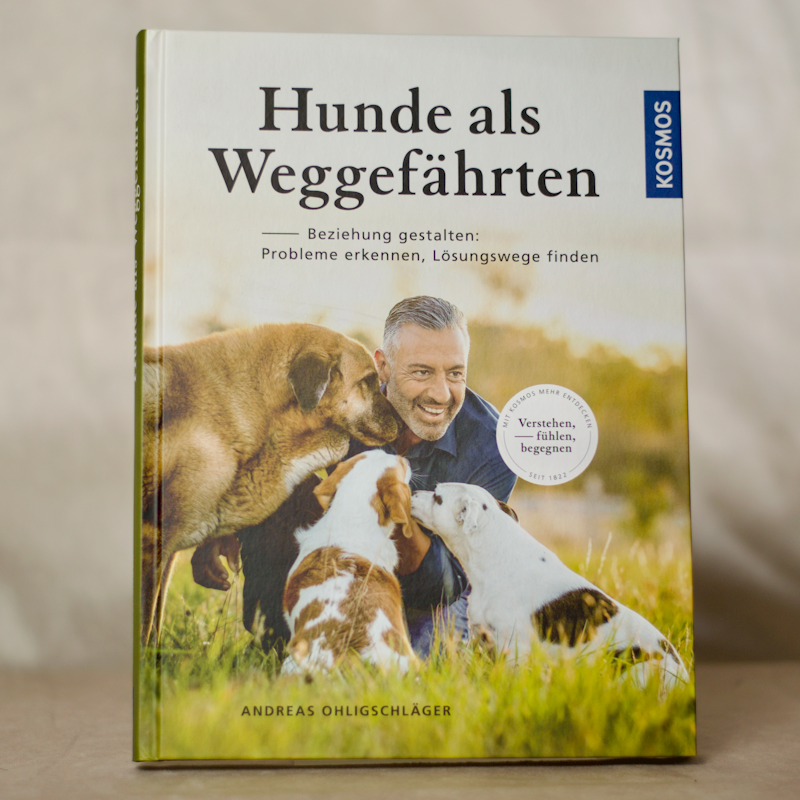 Buchcover Andreas Ohligschlaeger: Hunde als Weggefaehrten