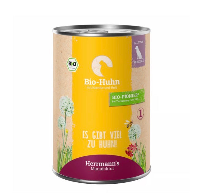 Eine Hunde- Nassfutter Dose von der Sorte Huhn mit Karotte und Reis 