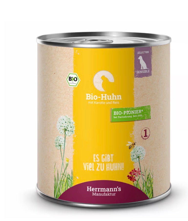 Eine Hunde- Nassfutter Dose von der Sorte Huhn mit Karotte und Reis 