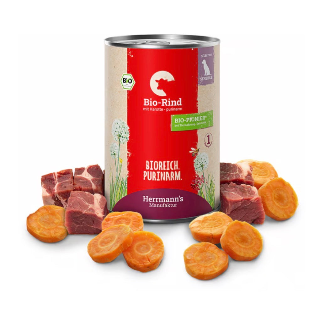 Eine Nassfutter Dose für Hunde von der Sorte Rind, extra purinarm mit den Zutaten auf dem Bild 