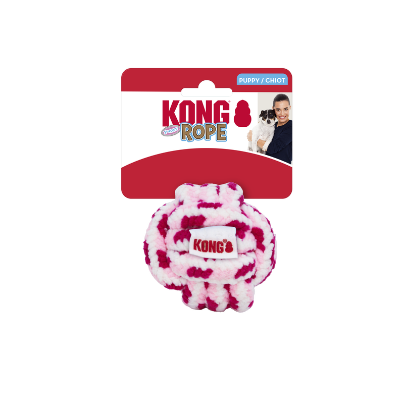 Weiches KONG Puppy Rope Hundespielzeug in Rosa und Pink aus Fleece-Material, in Originalverpackung, auf transparentem Hintergrund
