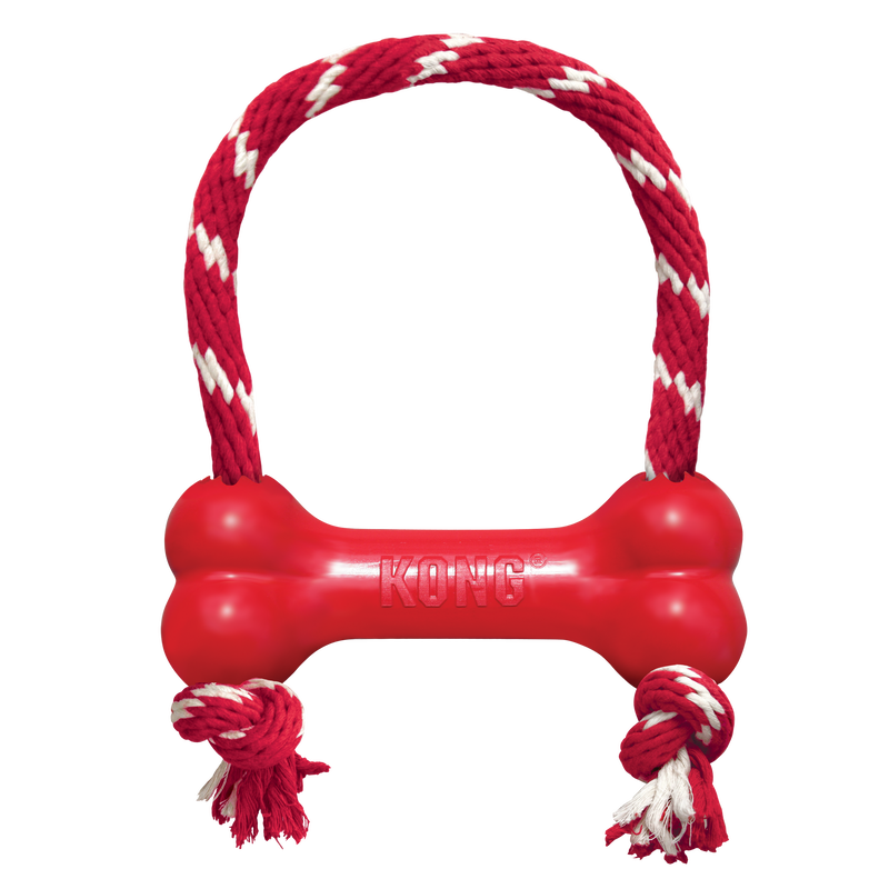 Rotes KONG Hundespielzeug aus robustem Gummi mit rot-weißem Tau auf transparentem Hintergrund
