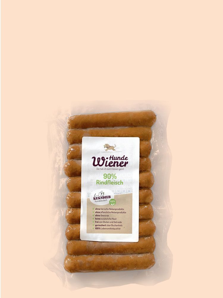 Vakuumverpackte Hunde-Wiener aus 90 % Rindfleisch von Keksdieb, naturbelassene Hundewürste ohne Zusatzstoffe, glutenfrei und schonend über Buchenholz geräuchert.