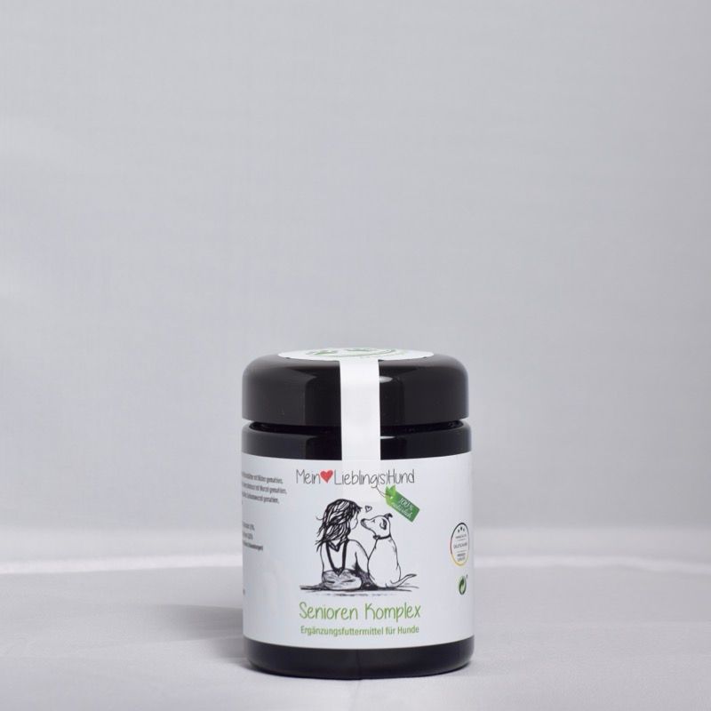 Mein LieblingsHund Senioren Komplex in dunklem Glasbehaelter, Ergaenzungsfuttermittel fuer Hunde, Produktetikett mit Illustration von Hund und Mensch
