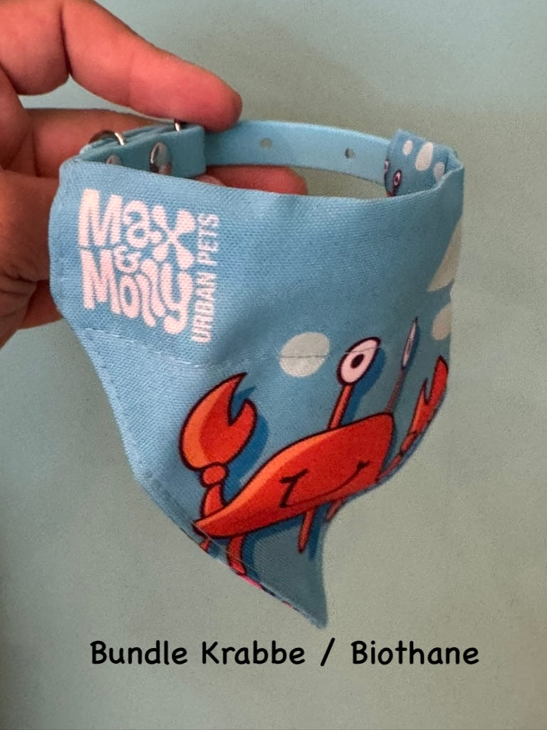 Max & Molly Hundebandana Blue Ocean mit orangefarbenem Krebs-Motiv
Wendebandana für Hunde mit Unterwasserwelt und Meerestieren von Max & Molly mit hellblauem Biothane Halsband