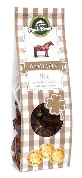 Pauls Beute Großes Glück Pferd Hundesnack in transparenter Tüte mit braun kariertem Etikett und Pferde-Illustration, natürlicher Monoprotein-Kauartikel für Hunde.
