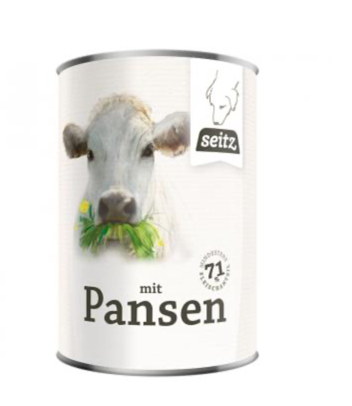 Dose Hundefutter der Firma Seitz "mit Pansen". Abbildung zeigt weiße Kuh mit Büschel Gras im Maul
