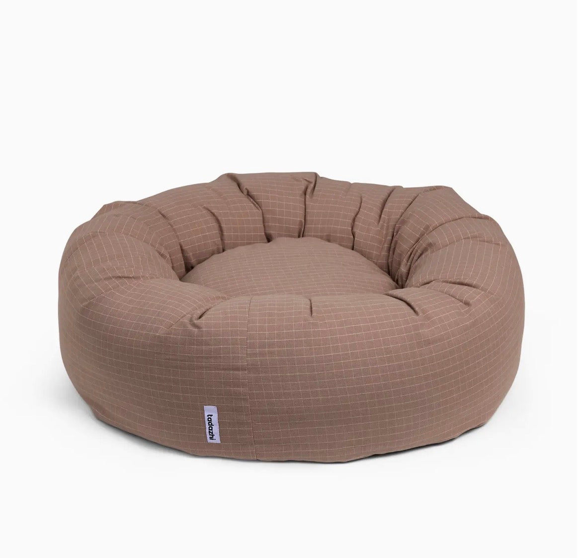 Ein Hundebett in Donutform in Rosa von der Firma Tadazhi 