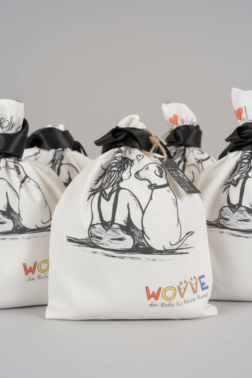 weiße Schulterbeutel mit Logoaufdrucken von Mein Lieblingshund und Wovve