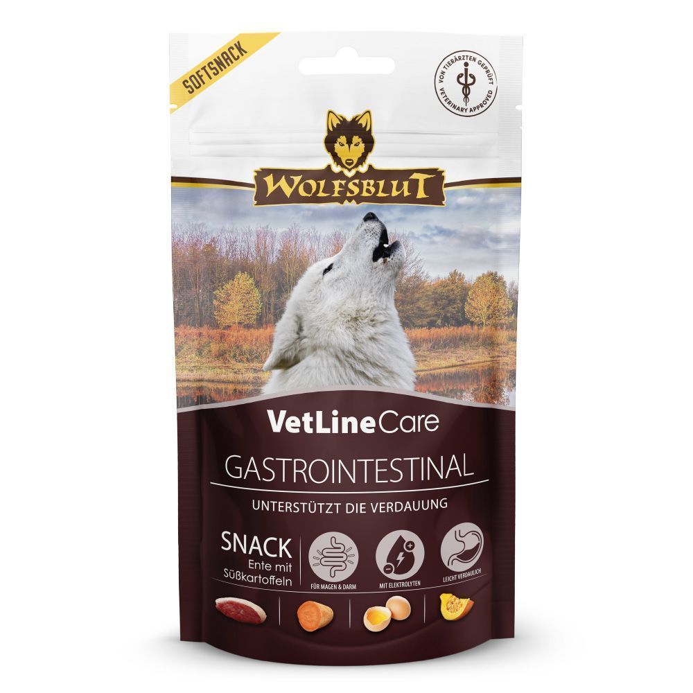 WOLFSBLUT VetLine Care Snack Gastrointestinal – weicher funktionaler Hundesnack mit Ente zur Unterstützung der Verdauung und Entlastung von Magen und Darm. Heulender weißer Wolf vor herbstlicher Landschaft